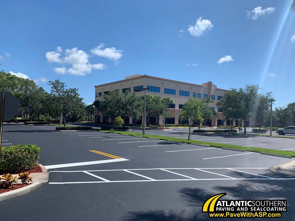 Nothing better than a sunny day and a newly sealed and striped parking lot! by Atlantic Southern Paving and Sealcoating